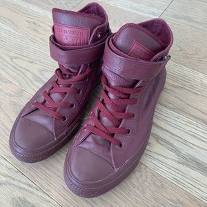 Burgundy leather high top converse